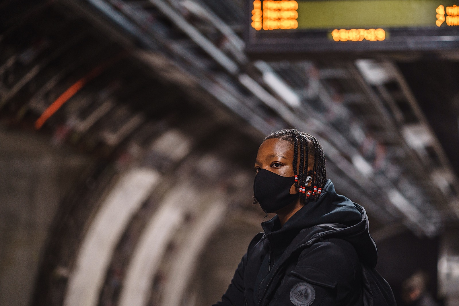 Person wearing mask during Covid at Train station